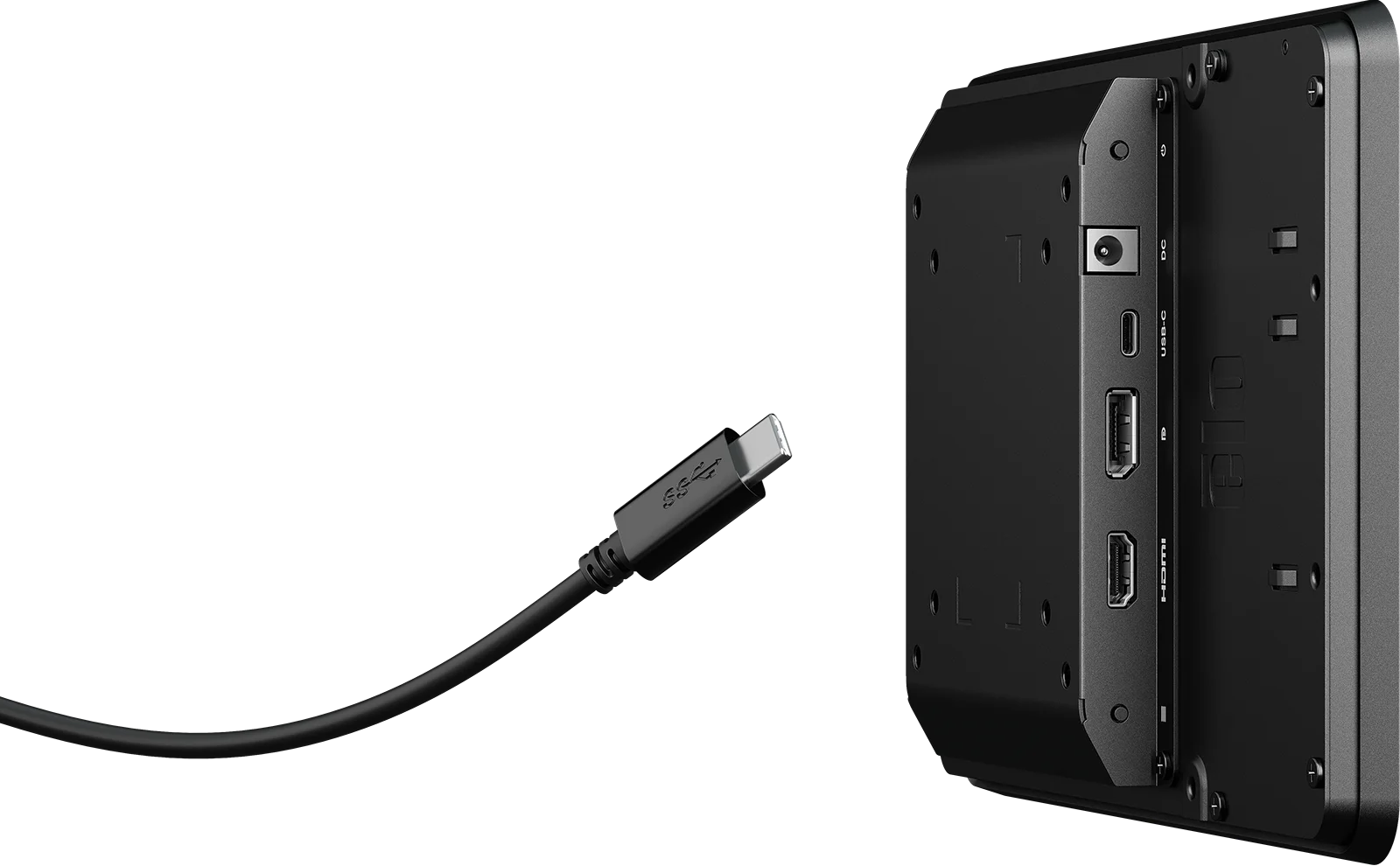 Type C cable hovering near rear peripheral ports, prominently displaying available ports.